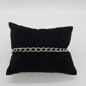 silver tone chain bracelet with sea world charm